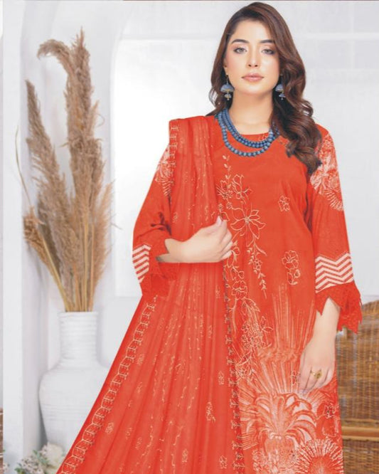 Woman wearing a red embroidered dress with a white background